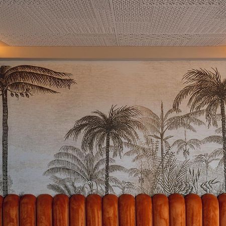 Hotel Jadali & Spa มาร์ราเกช ภายนอก รูปภาพ Palm trees on the wall of the lobby