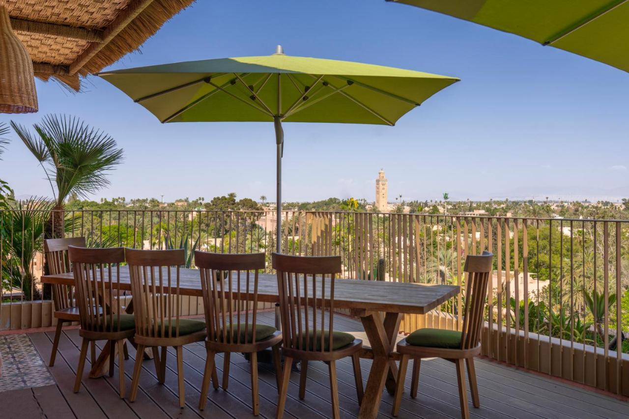 Hotel Jadali & Spa มาร์ราเกช ภายนอก รูปภาพ A patio umbrella